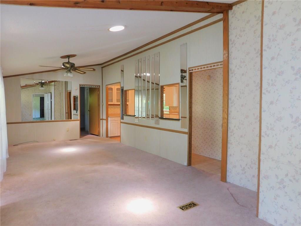 163 Glade Run Road Renfrew, PA 16053 - Photo 6 of 25 Living room has vaulted ceilings.
