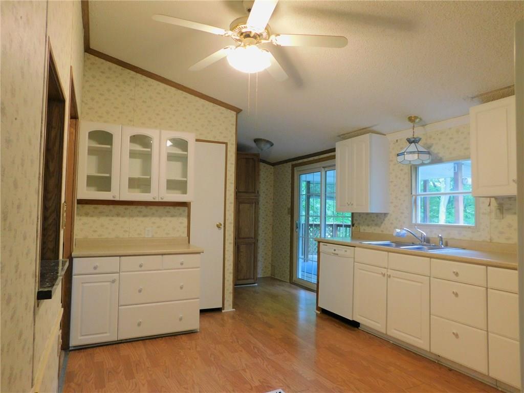 163 Glade Run Road Renfrew, PA 16053 - Photo 7 of 25 Kitchen with white cabinets.