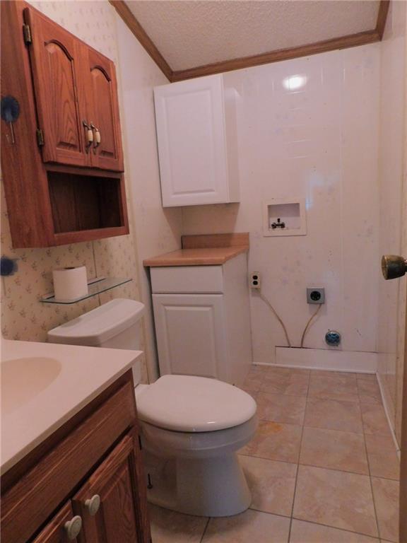 163 Glade Run Road Renfrew, PA 16053 - Photo 10 of 25 Half bath & first floor laundry.