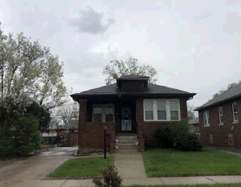 307 Webb Street Calumet City, IL 60409 - Photo 2 of 2 a front view of a house with a yard