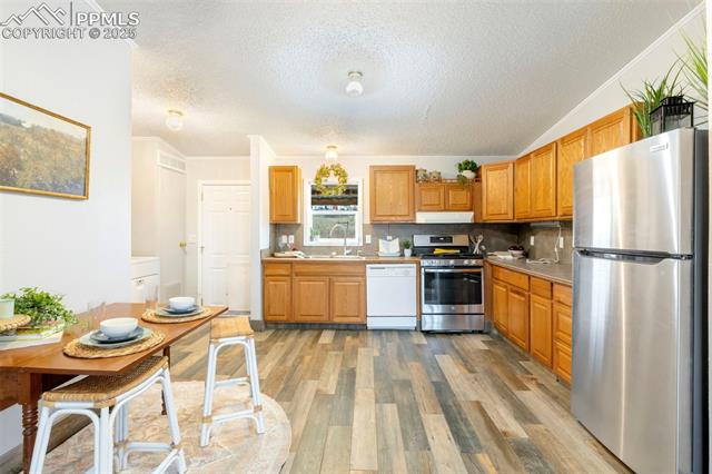 15345 Trigger Road Peyton, CO 80831 - Photo 11 of 26 Kitchen and eat-in nook