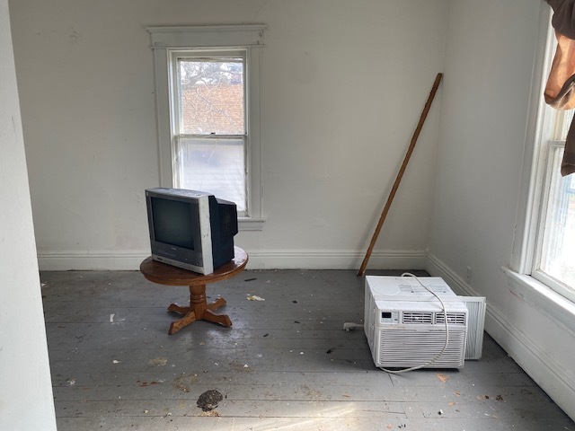 304 East Front Street Wyanet, IL 61379 - Photo 9 of 13 a living room with furniture and a window