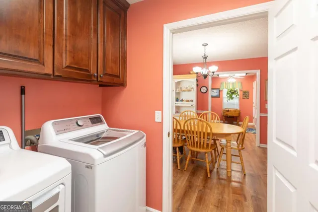 a living room with furniture a window and a fireplace