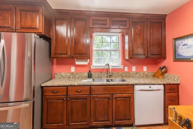 a kitchen with a stove and a microwave