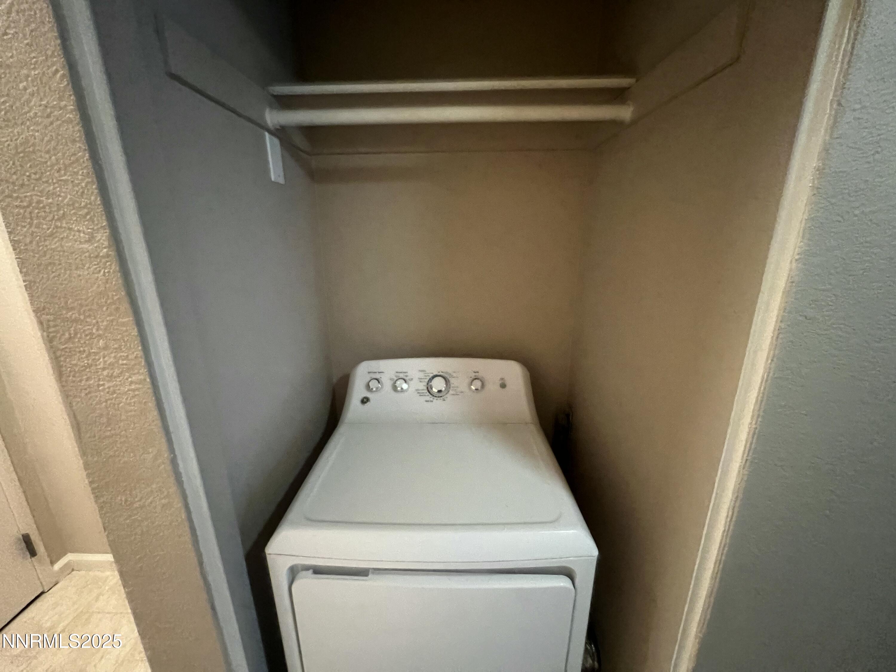 3095 Lakeside Drive, Unit 110 Reno, NV 89509 - Photo 18 of 49 a utility room with dryer and washer