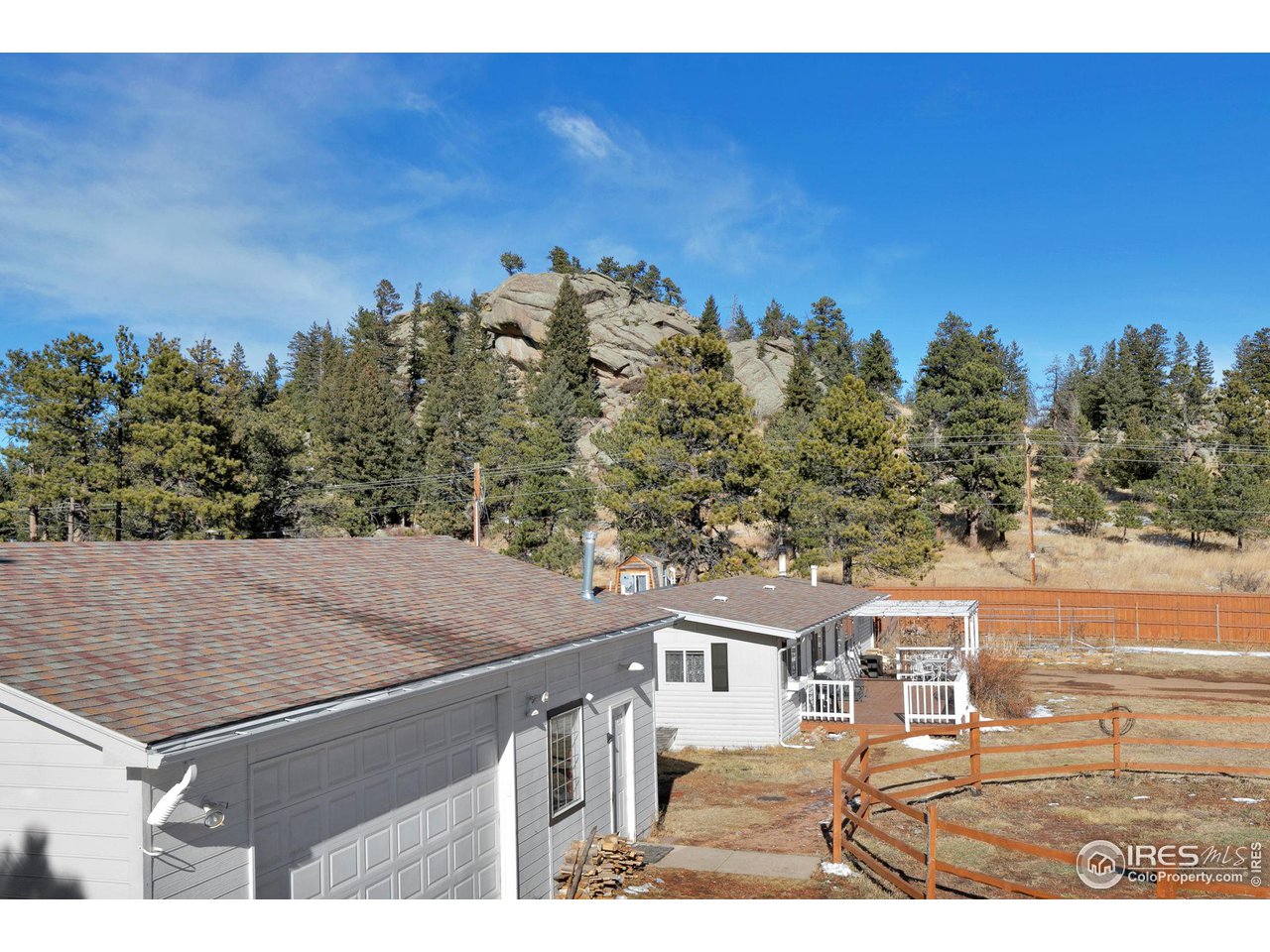 11725 Ranch Elsie Road Golden, CO 80403 - Photo 28 of 40 a view of a city from a terrace