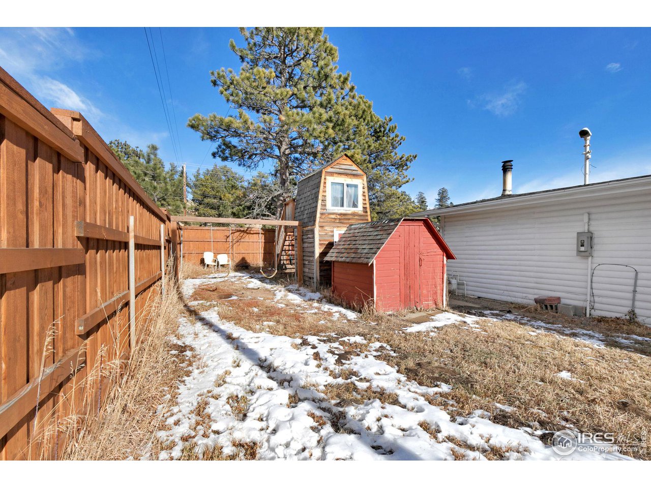 11725 Ranch Elsie Road Golden, CO 80403 - Photo 35 of 40 a view of a backyard of the house