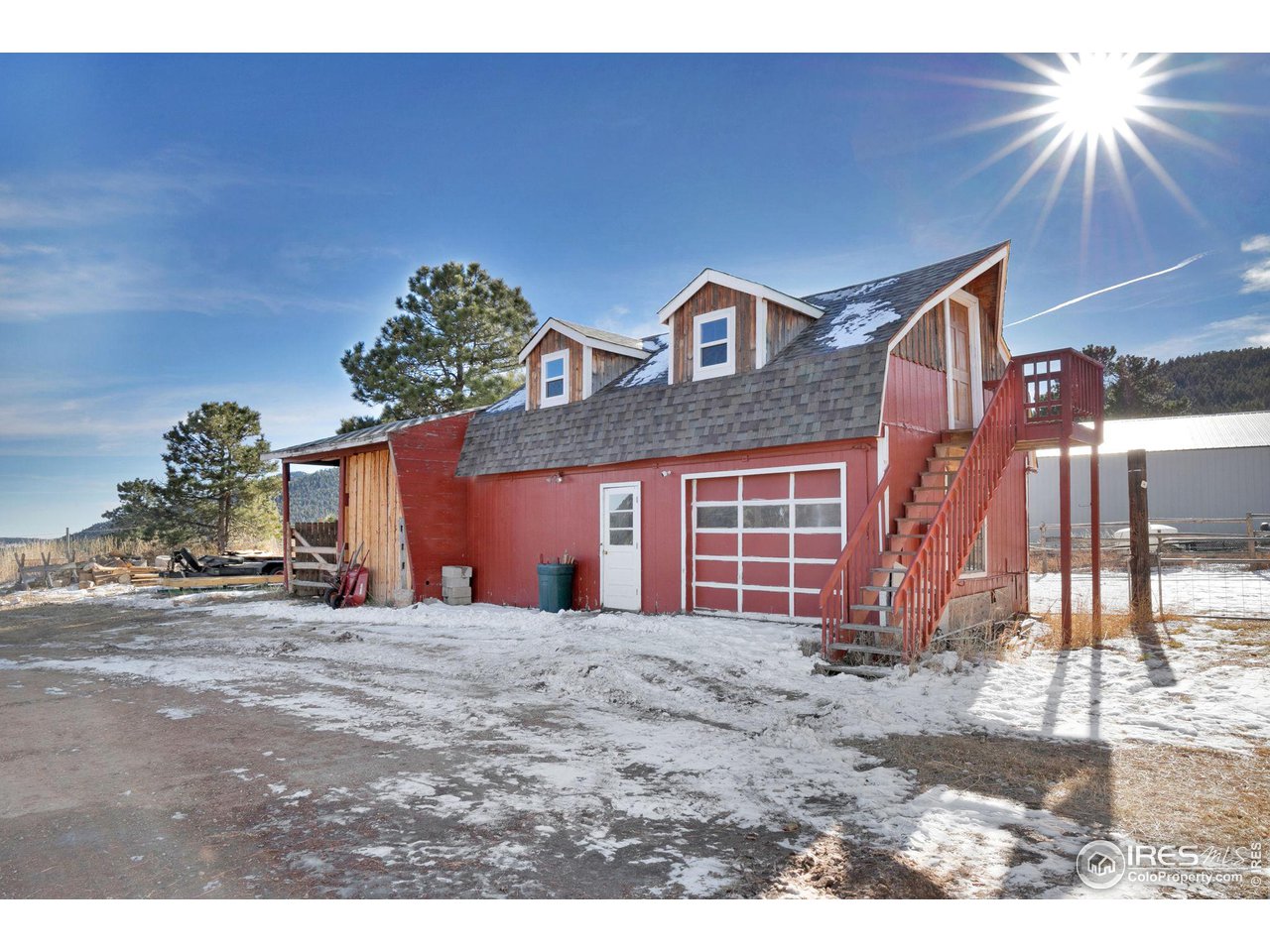 11725 Ranch Elsie Road Golden, CO 80403 - Photo 4 of 40 a view of a house with a yard