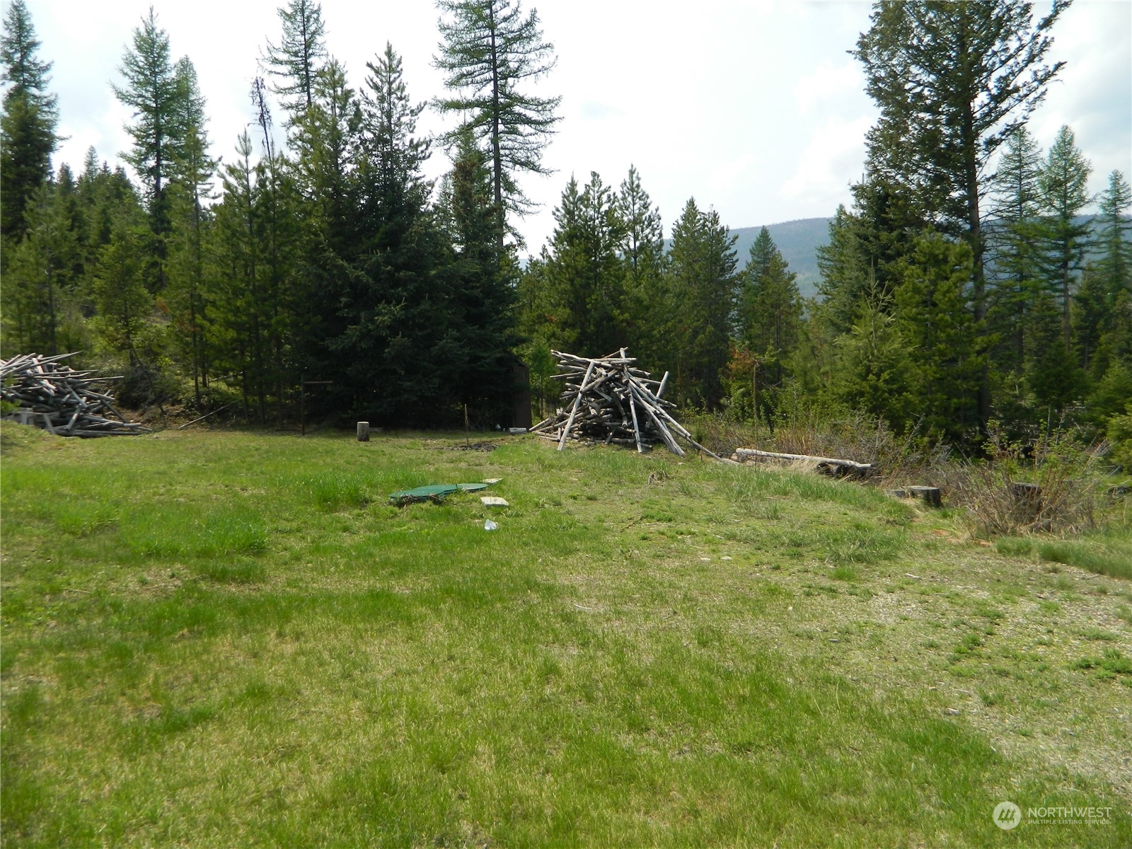 8 Fs 3200 Road Tonasket, WA 98855 - Photo 17 of 34 a view of outdoor space with deck and yard