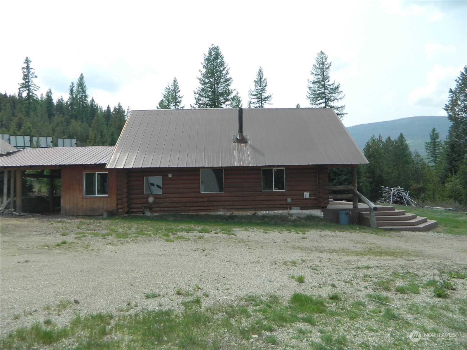 8 Fs 3200 Road Tonasket, WA 98855 - Photo 19 of 34 a view of a house with a yard and a large tree