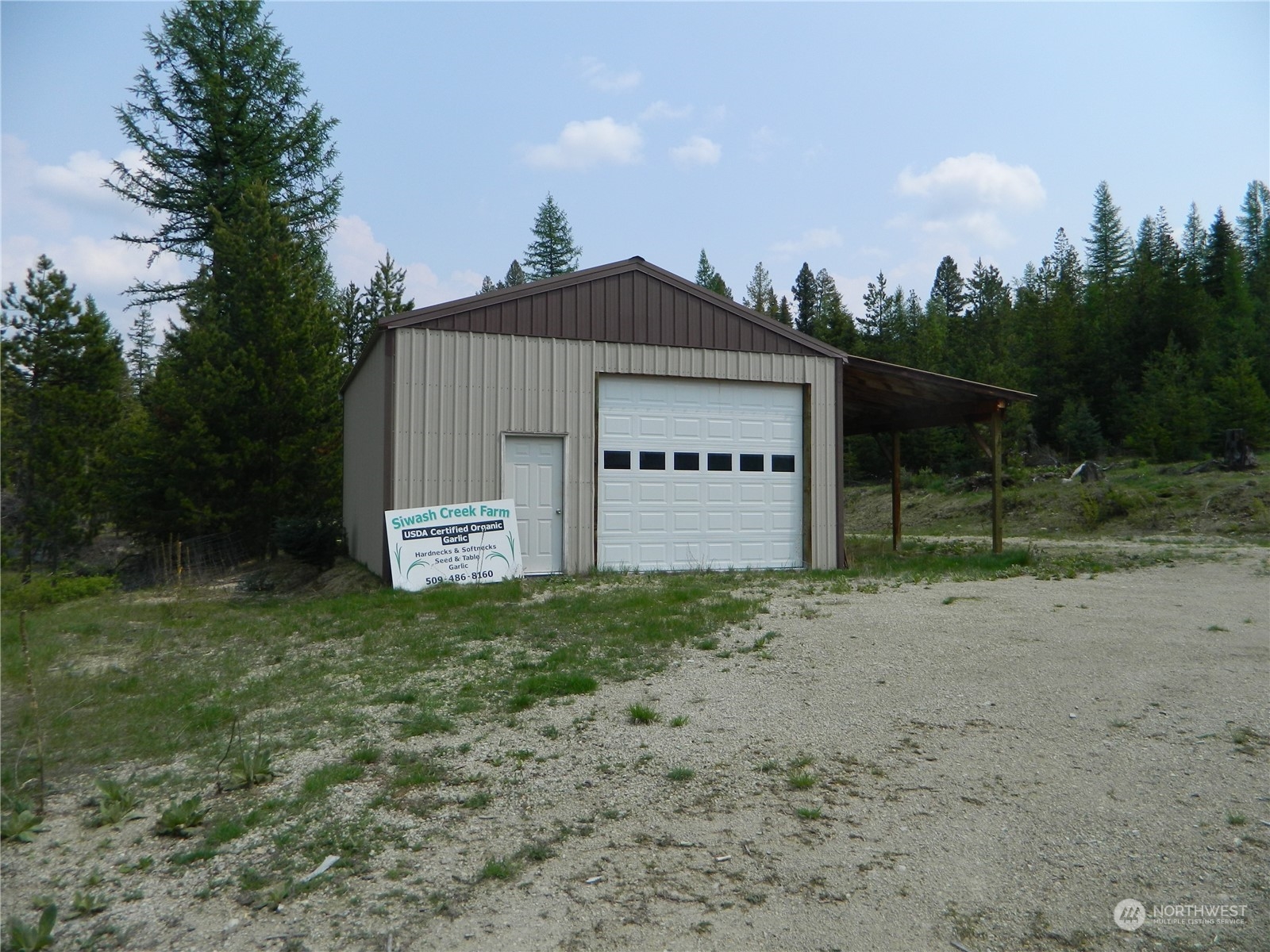 8 Fs 3200 Road Tonasket, WA 98855 - Photo 23 of 34 a view of a house with a yard and large tree