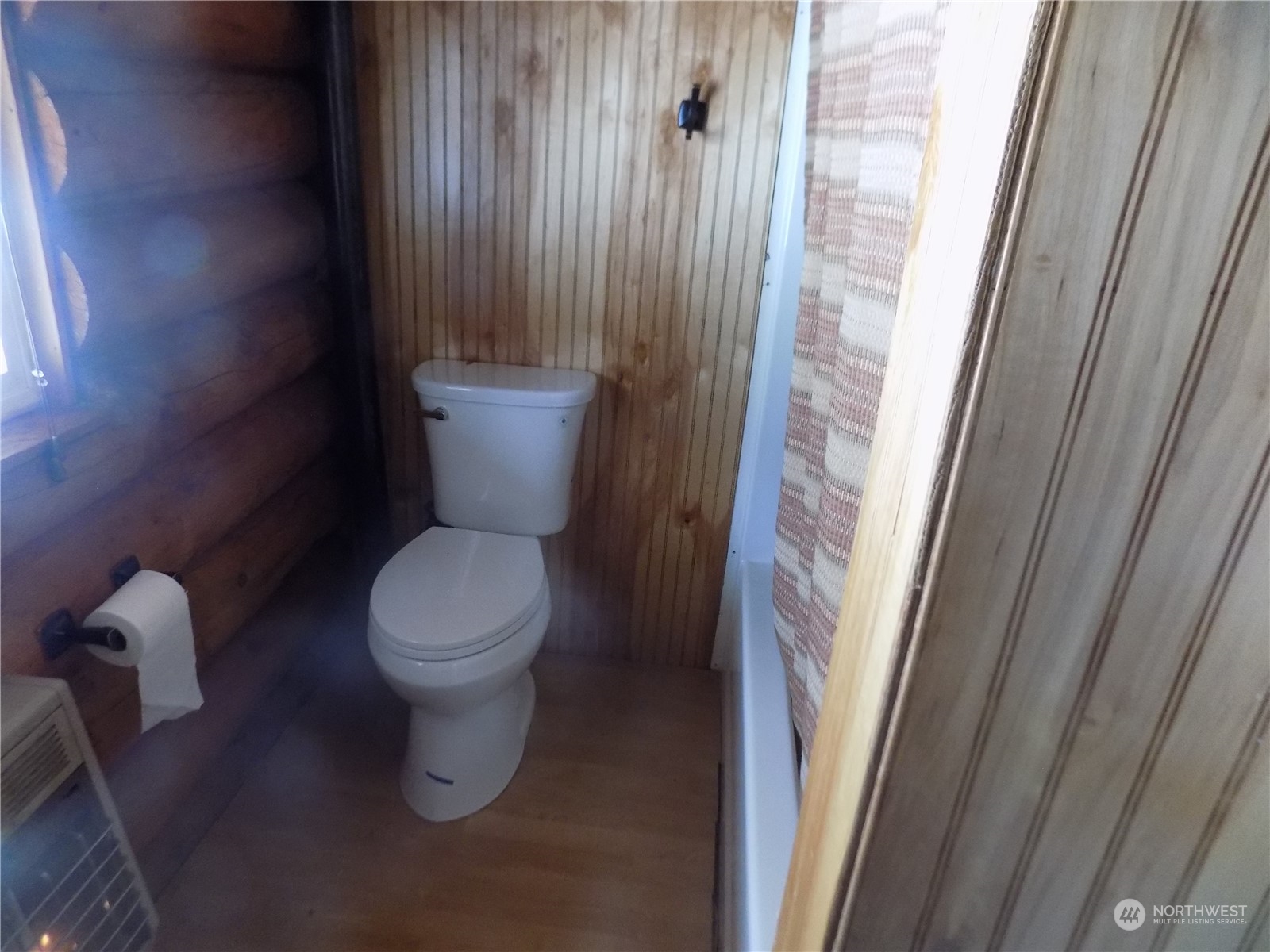 8 Fs 3200 Road Tonasket, WA 98855 - Photo 8 of 34 a white toilet sitting next to a shower