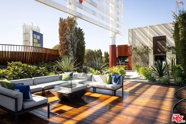 a outdoor living space with furniture and garden view