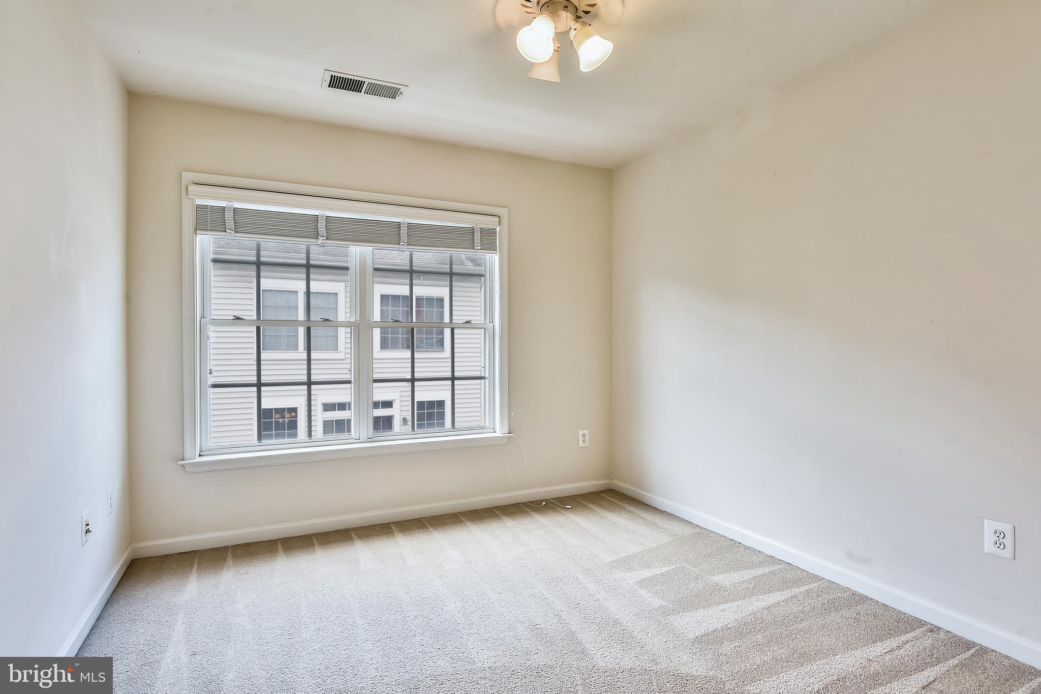 1216 Gaither Road Rockville, MD 20850 - Photo 27 of 46 Second Bedroom with Large Windows