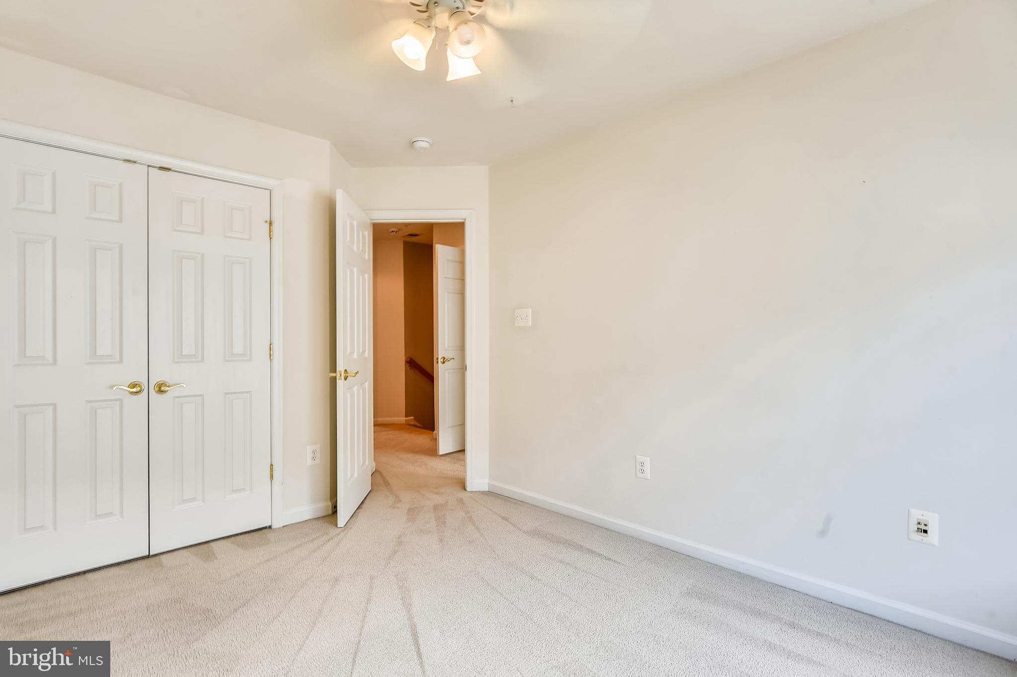 1216 Gaither Road Rockville, MD 20850 - Photo 28 of 46 Third Bedroom with Large Closet and Ceiling Fan