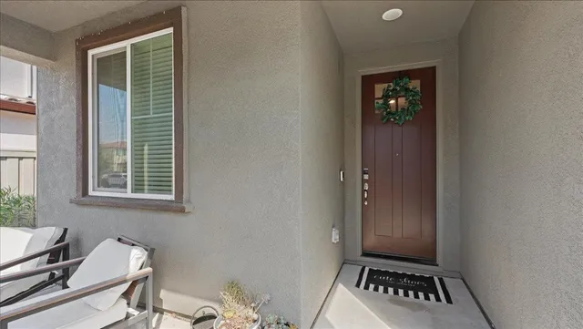 a view of room with window and bathroom