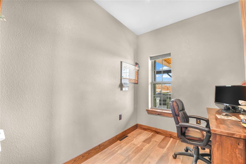 854 County Road 3330 Bridgeport, TX 76426 - Photo 22 of 40 The office has a built in desk and shelving