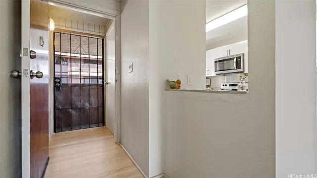 a bathroom with a sink a mirror and shower