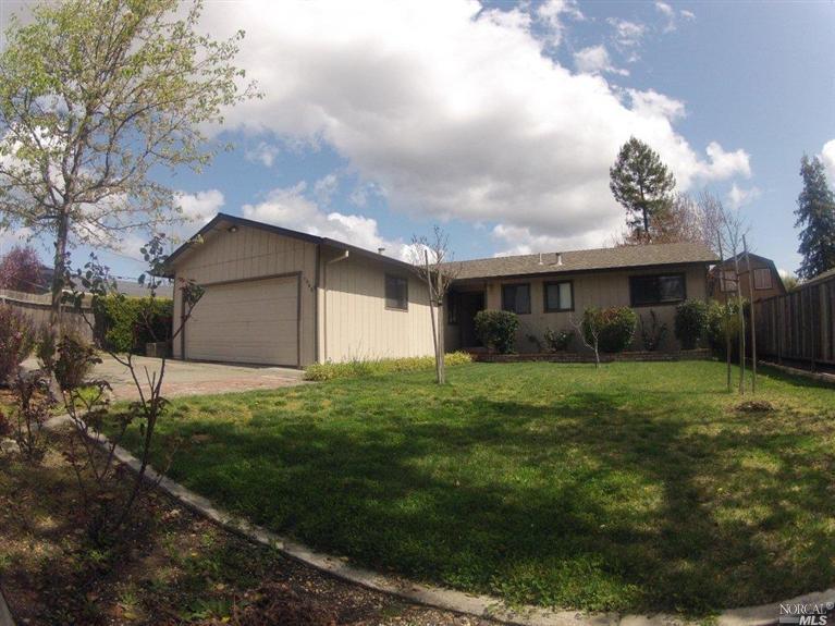 1060 Baird Road Santa Rosa, CA 95409 - Photo 1 of 1 a backyard of a house with lots of green space
