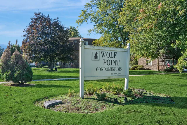 a sign on the side of the park