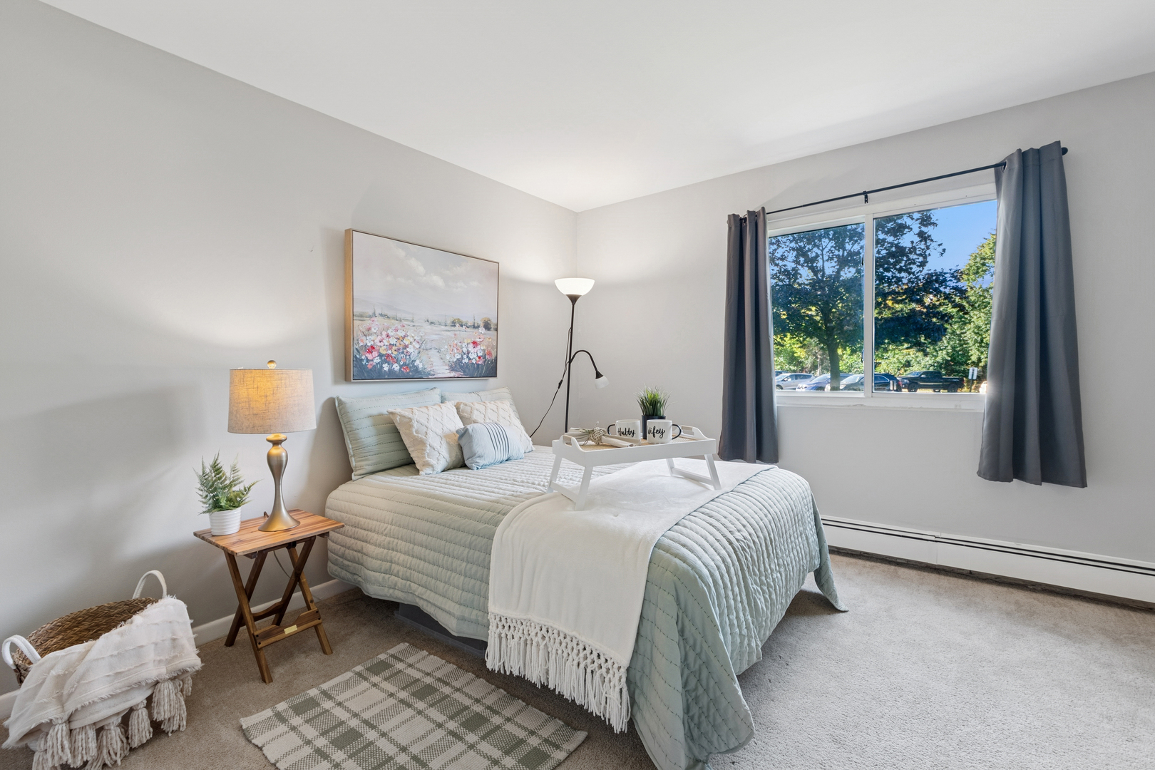 19300 Wolf Road, Unit 2 Mokena, IL 60448 - Photo 7 of 17 a bedroom with a bed and a large window