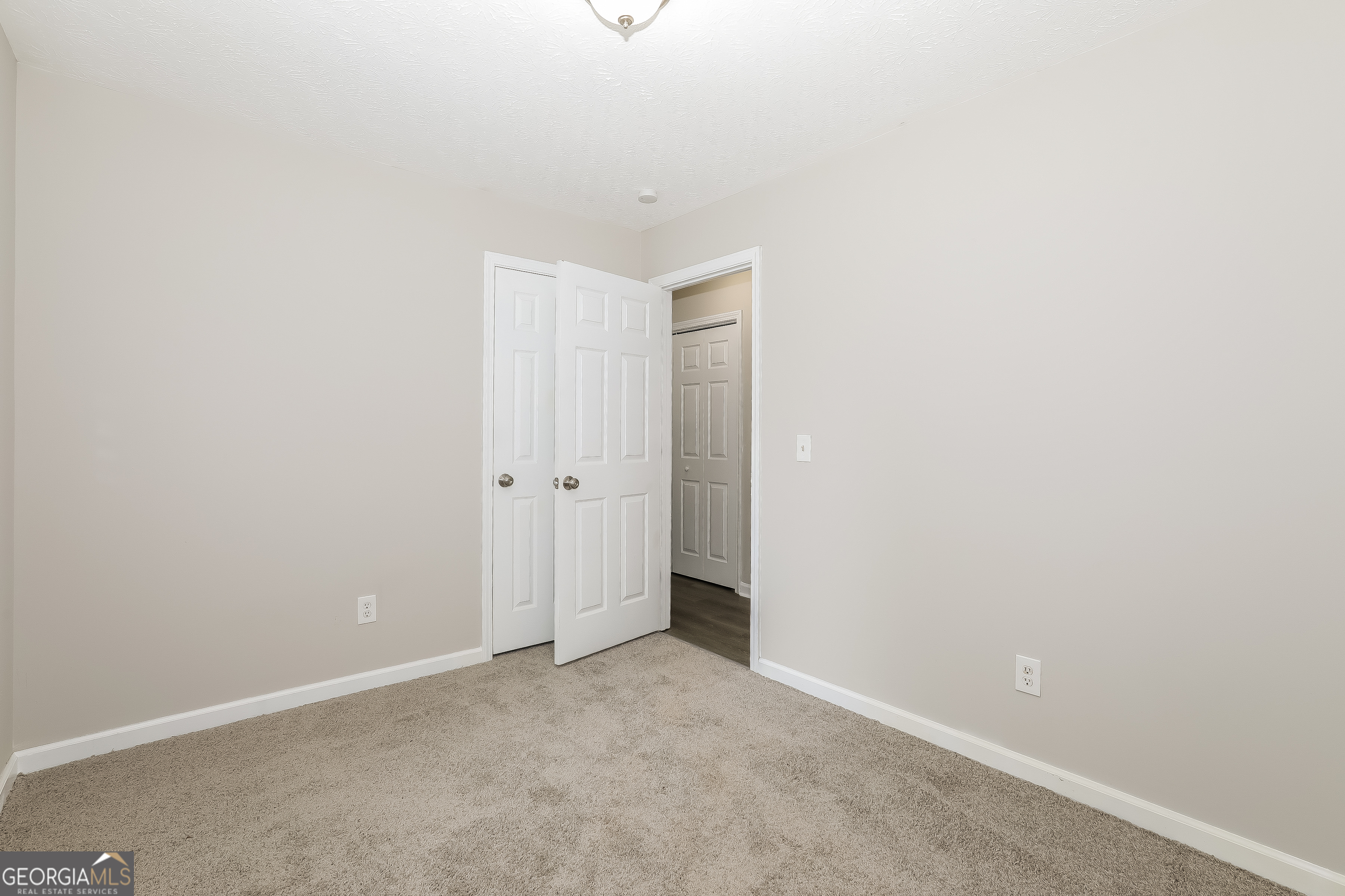 6530 River Hill Drive Flowery Branch, GA 30542 - Photo 11 of 14 a view of an empty room