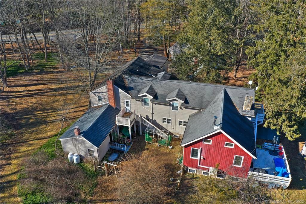 66 Weston Road Westport, CT 06880 - Photo 1 of 1 a aerial view of a house with a yard
