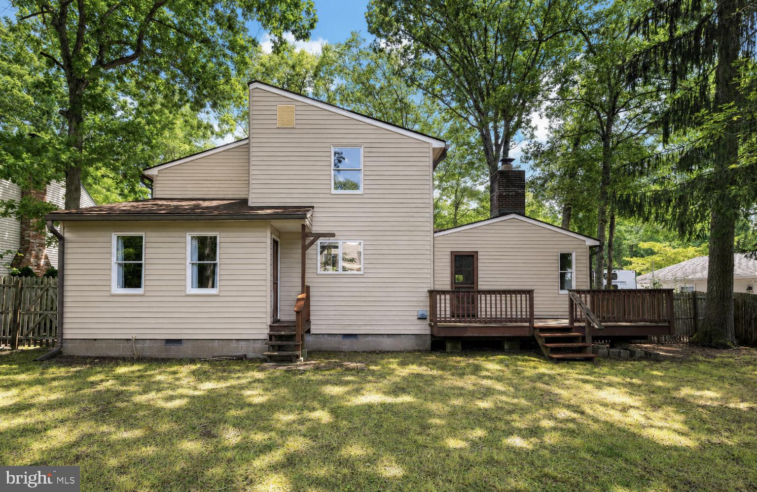166 Rutgers Avenue Manahawkin, NJ 08050 - Photo 27 of 30 Charming home nestled in lush greenery.