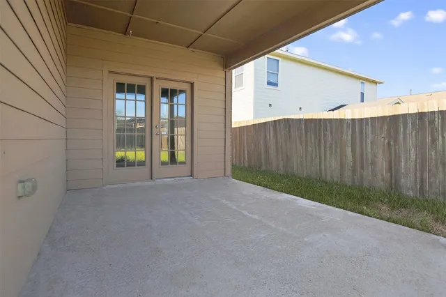 a view of an empty room with a sink