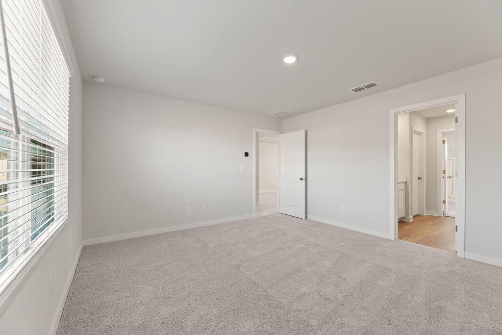 60 Poplar Blf Way Jefferson, GA 30549 - Photo 13 of 28 a view of an empty room with a window