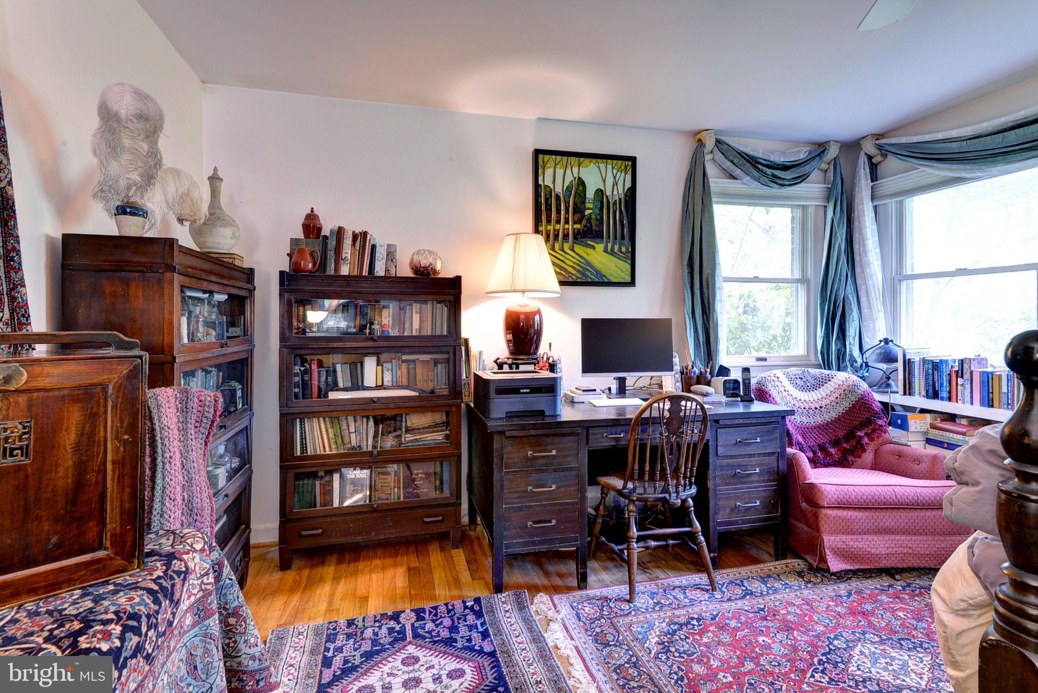 5556 Roanes Wharf Road Gloucester, VA 23061 - Photo 15 of 84 a view of a livingroom with workspace and a window