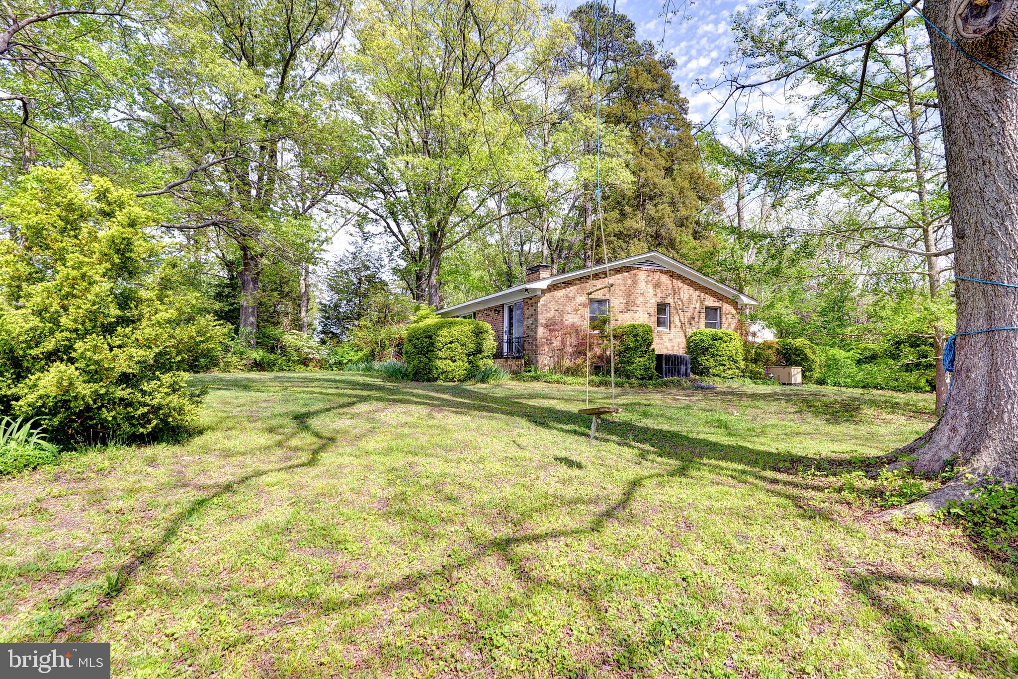 5556 Roanes Wharf Road Gloucester, VA 23061 - Photo 44 of 84 a front view of house with yard and green space