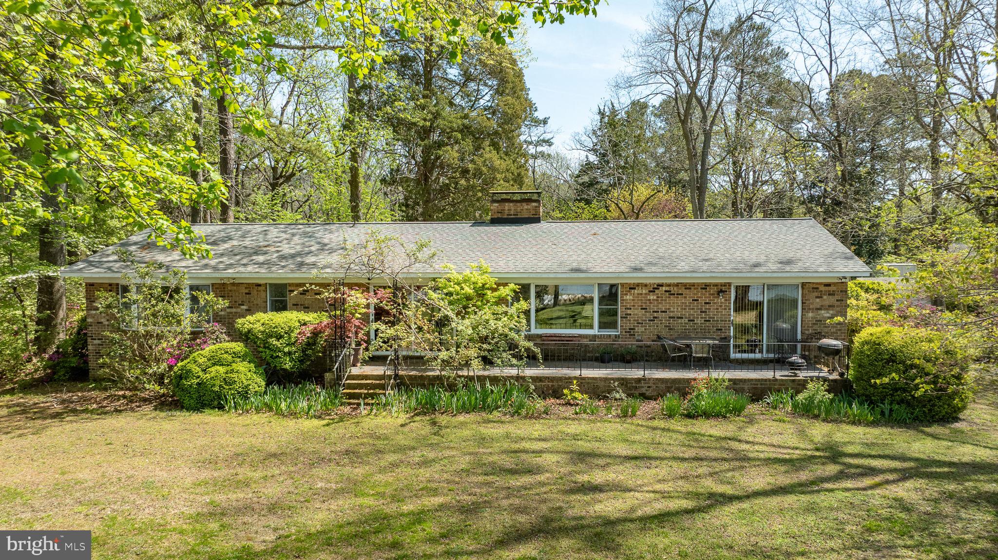 5556 Roanes Wharf Road Gloucester, VA 23061 - Photo 56 of 84 a view of a house with pool and sitting area