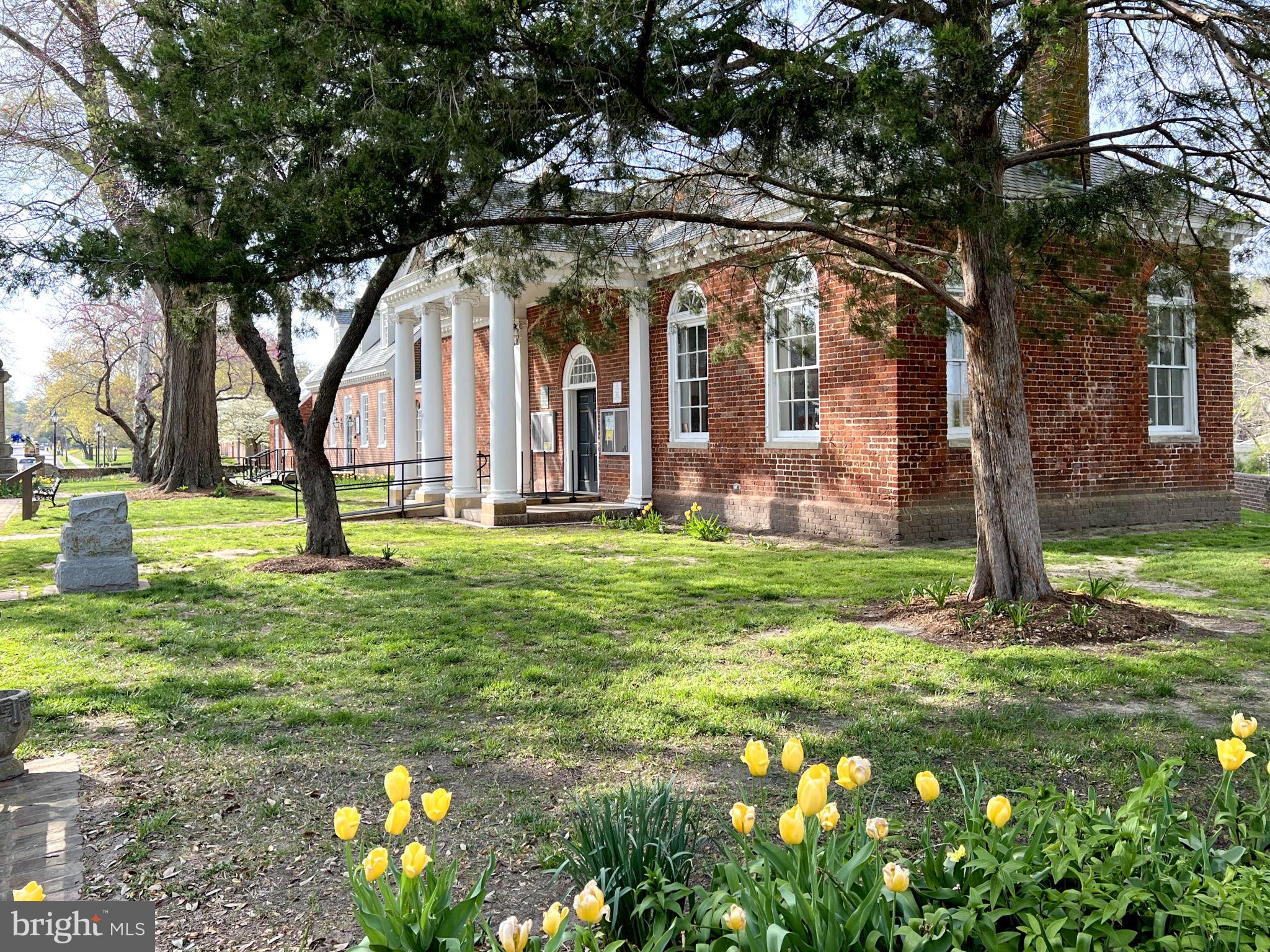 5556 Roanes Wharf Road Gloucester, VA 23061 - Photo 82 of 84 a view of a house with a big yard and large trees