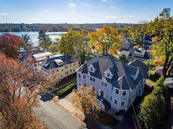 a view of a house with outdoor space and sitting area