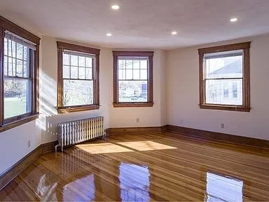 a view of an empty room and window