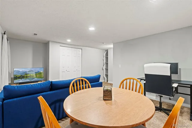 a view of a dining room with furniture