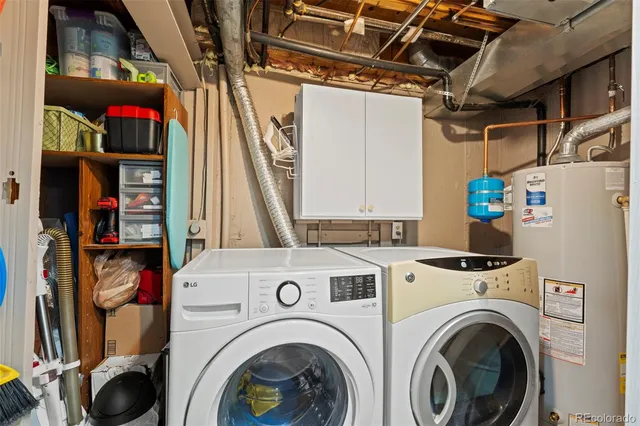 a view of storage and utility room with washer and dryer