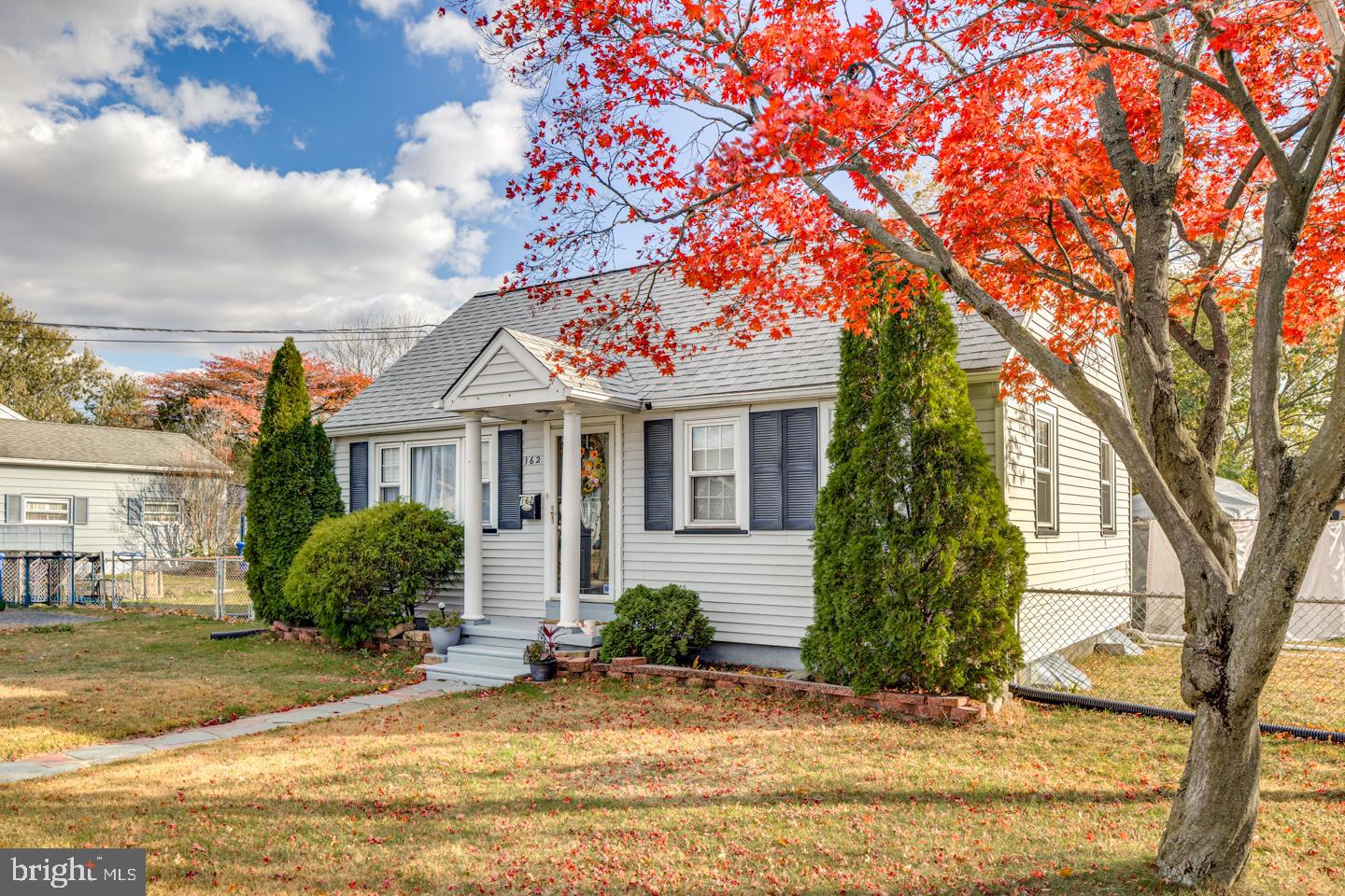 162 Oxford Road Cinnaminson, NJ 08077 - Photo 1 of 26 a front view of a house with garden