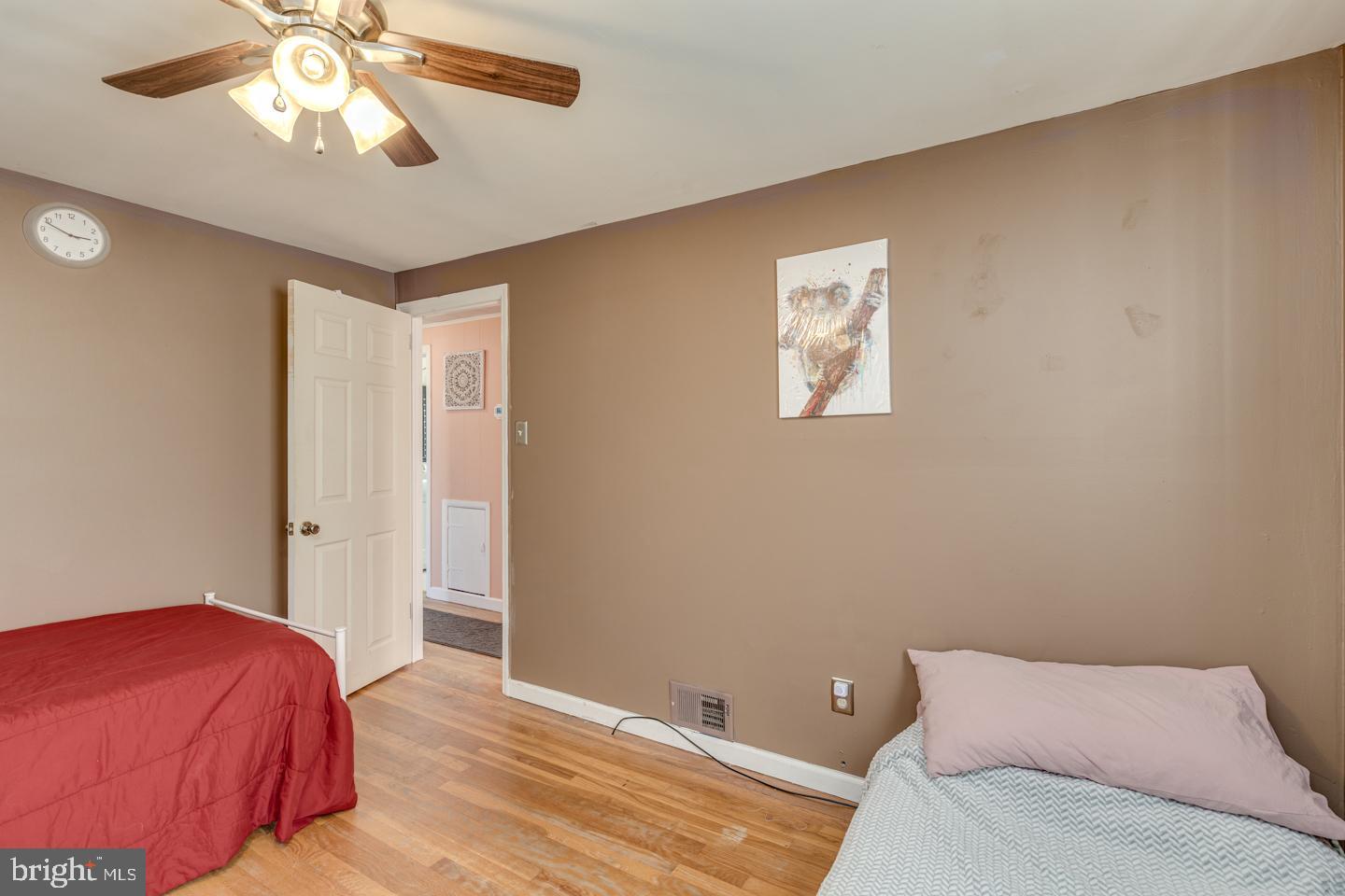 162 Oxford Road Cinnaminson, NJ 08077 - Photo 14 of 26 a bedroom with a bed and a chandelier