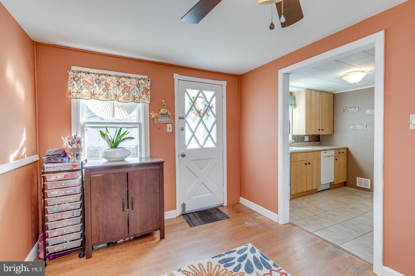 162 Oxford Road Cinnaminson, NJ 08077 - Photo 8 of 26 a view of a kitchen with a sink and dishwasher with wooden floor