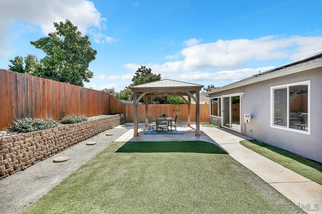 11021 Sagittarius Road San Diego, CA 92126 - Photo 13 of 28 a view of yard with patio