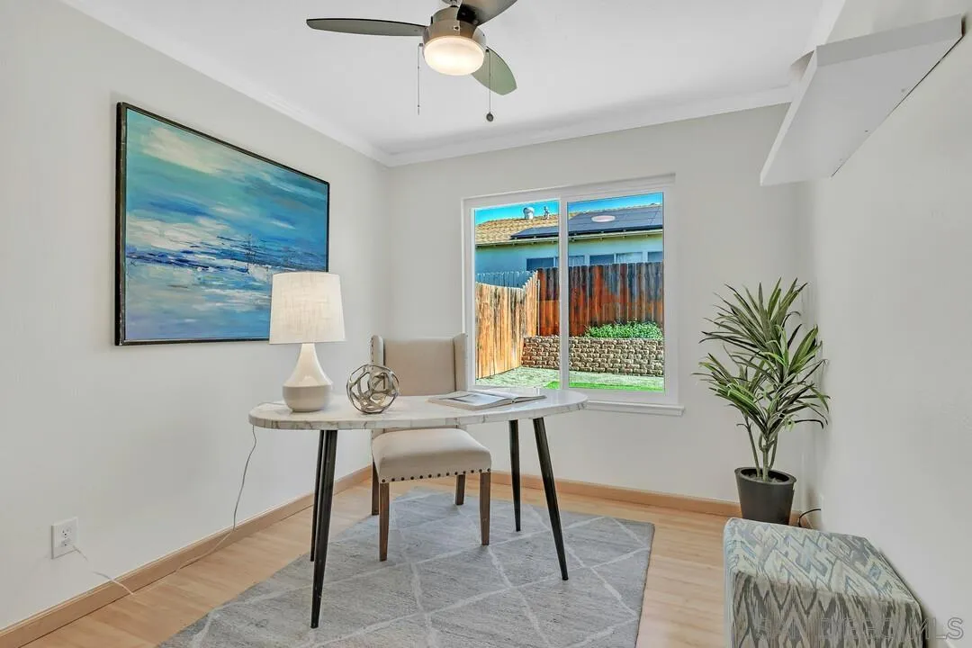 11021 Sagittarius Road San Diego, CA 92126 - Photo 22 of 28 a view of a livingroom with furniture and a potted plant