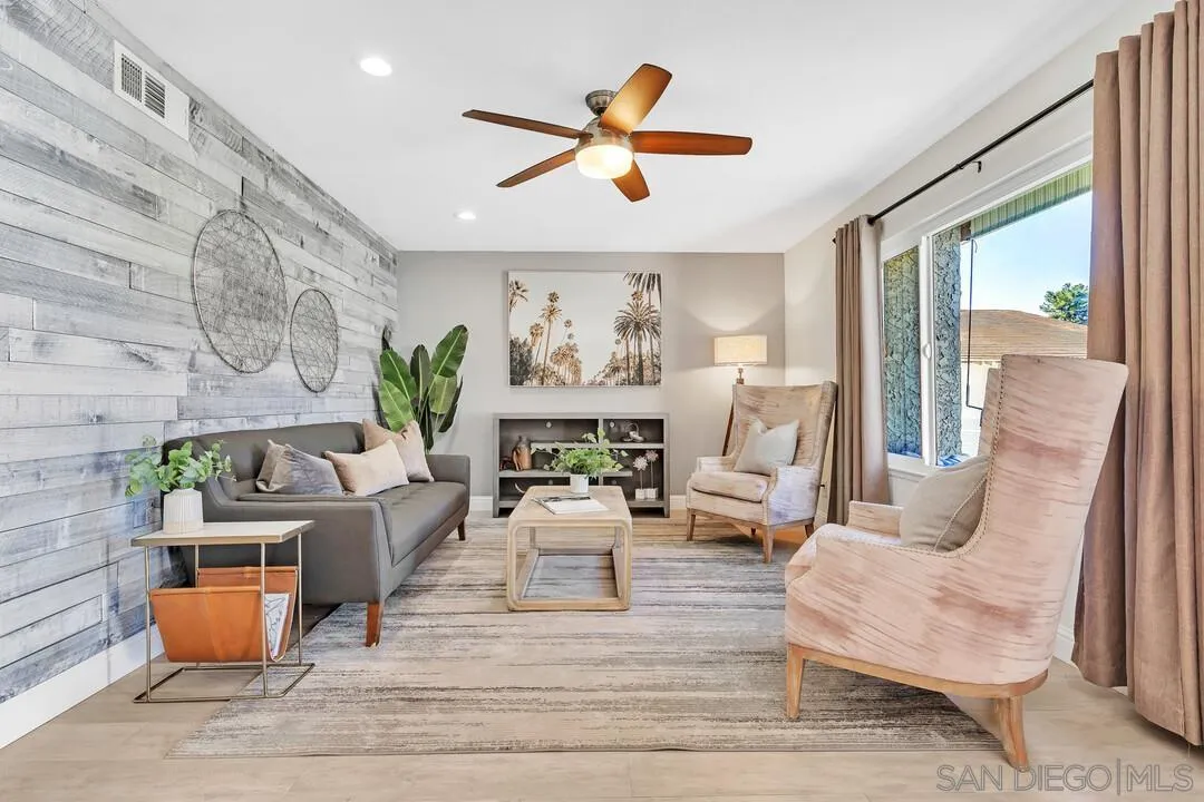 11021 Sagittarius Road San Diego, CA 92126 - Photo 3 of 28 a living room filled with furniture