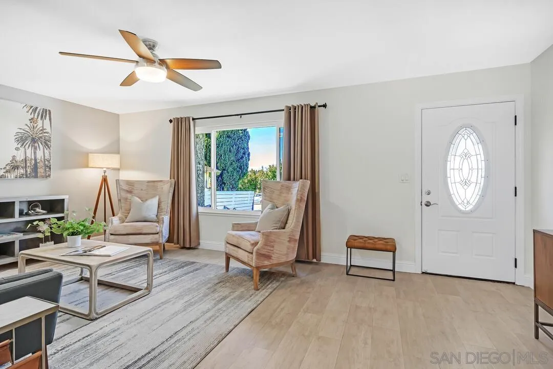 11021 Sagittarius Road San Diego, CA 92126 - Photo 5 of 28 a living room with furniture