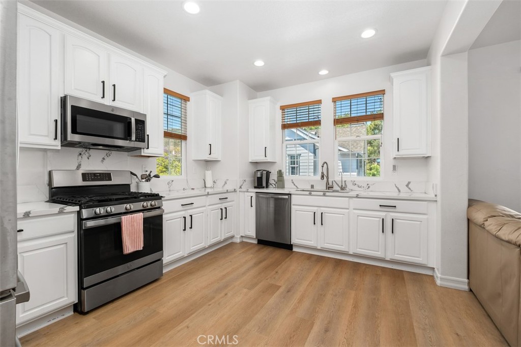 10 Thorp Ladera Ranch, CA 92694 - Photo 12 of 37 The kitchen showcases quartz countertops