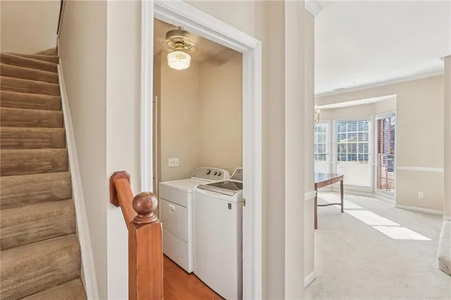 a bathroom with a sink and mirror with bathtub