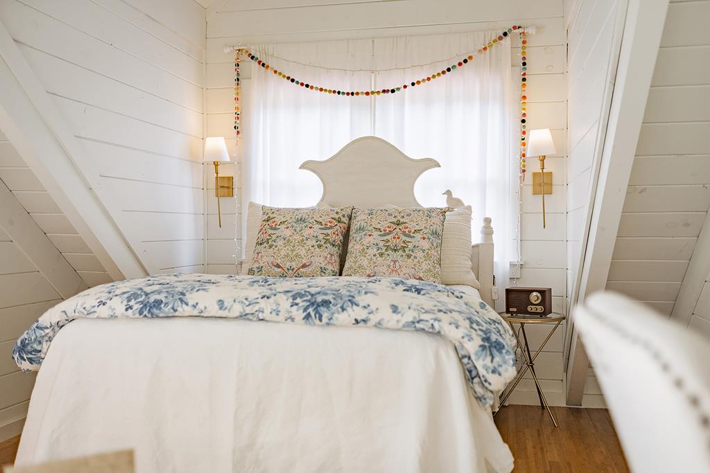 328 Black Ankle Creek Road Cherry Log, GA 30522 - Photo 29 of 103 a bed sitting in a bedroom next to a bathroom