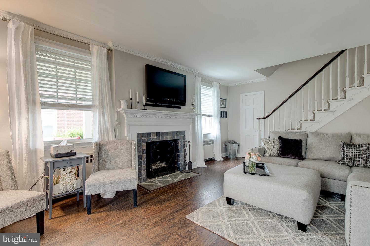 221 Avon Road Springfield, PA 19064 - Photo 7 of 35 Living room -wood-burning fireplace