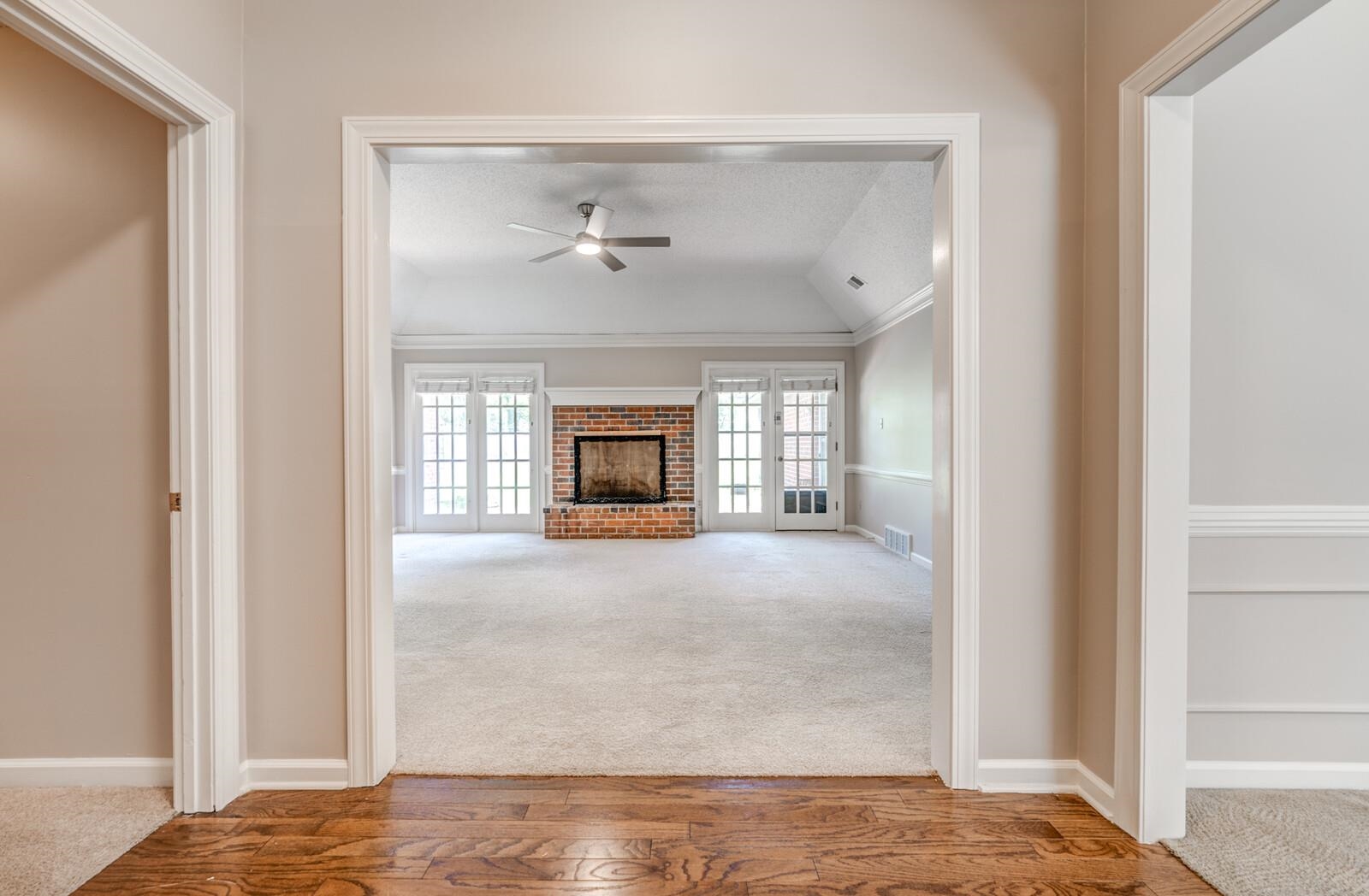8198 Walnut Creek Road Memphis, TN 38018 - Photo 4 of 32 10' ceiling with crown molding, hardwood floor and new light fixture.